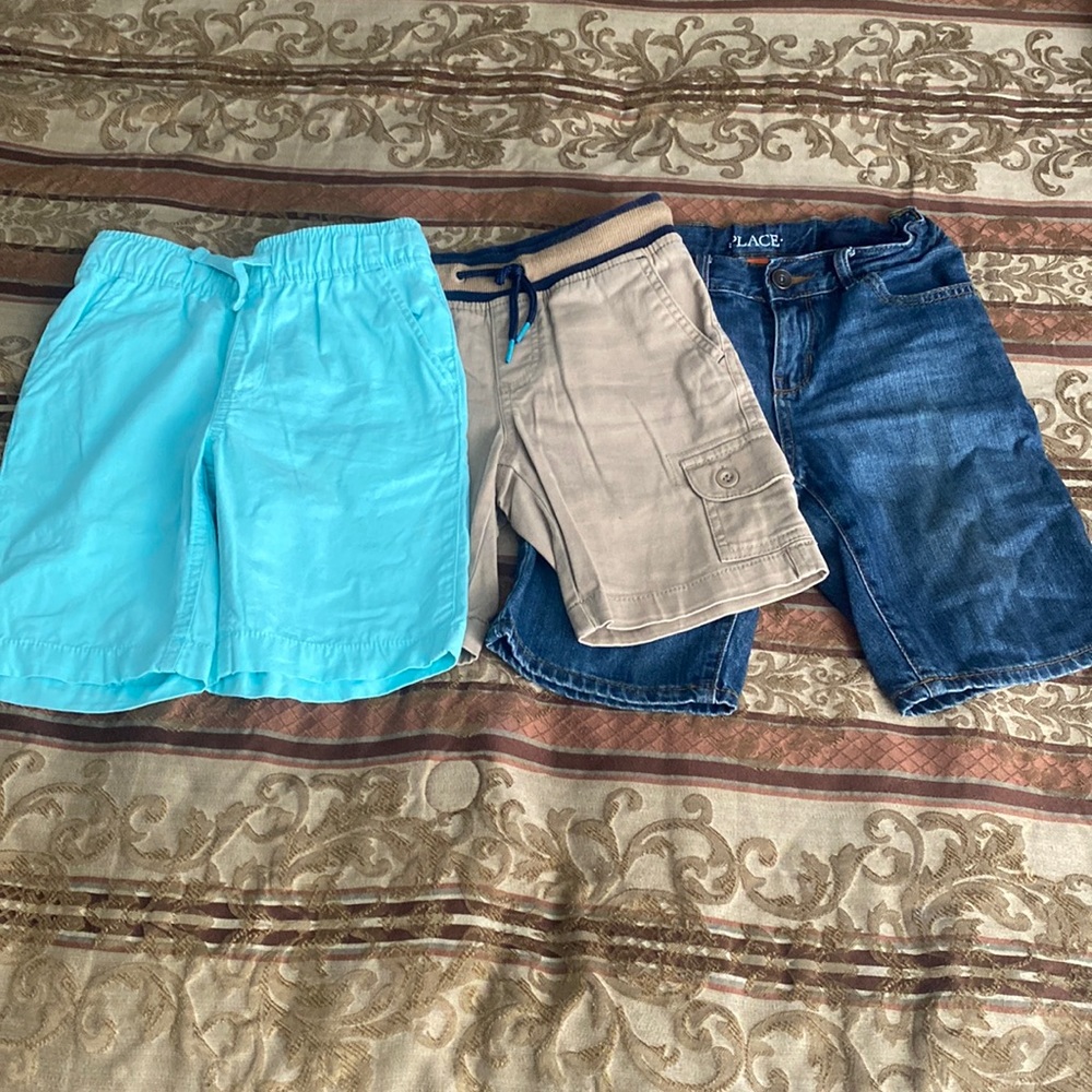 Children place boys shorts